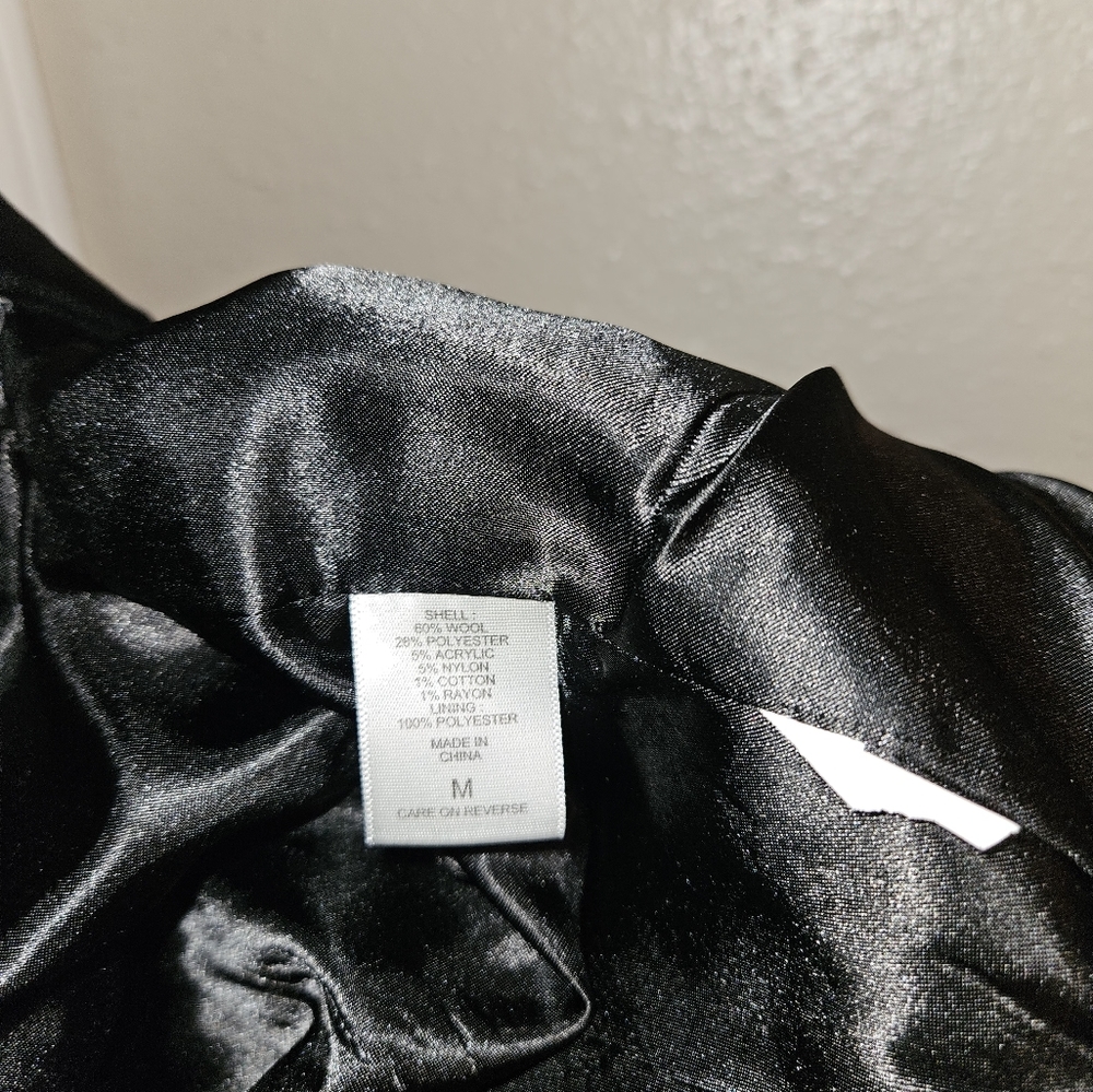Long Black coat. M, 34 inches long from shoulder and 36 inches from the neck